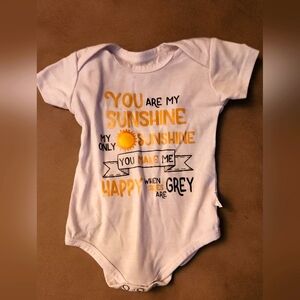 White 3 Month Old Oneies with a saying